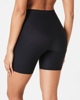 SPANXsupersmoothâ„¢ Essential Mid-Thigh Short | Very Black